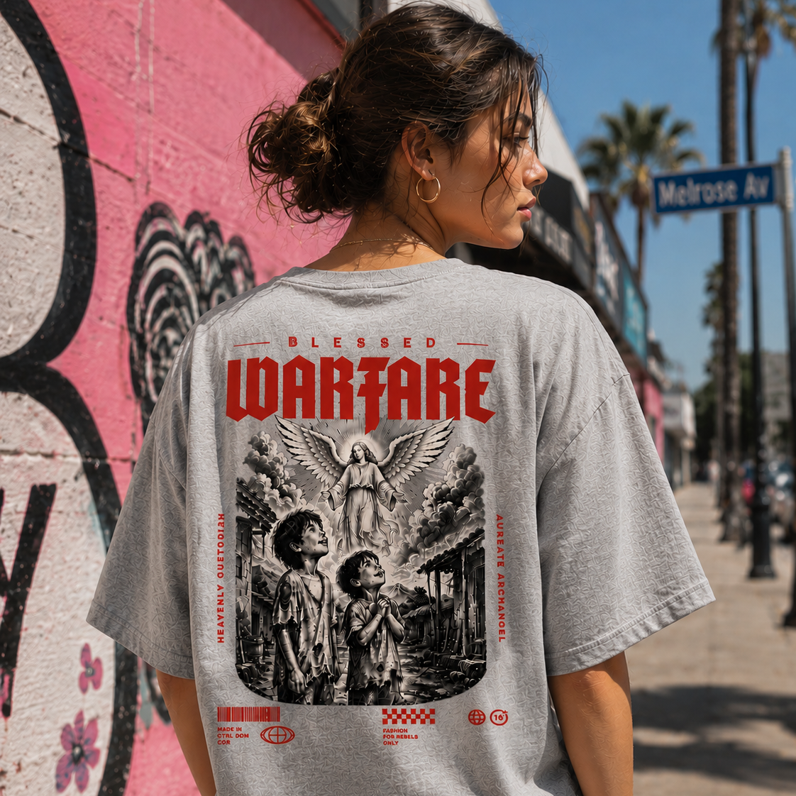 Gray Blessed Warfare T-shirt featuring a guardian angel design, symbolizing protection and grace.